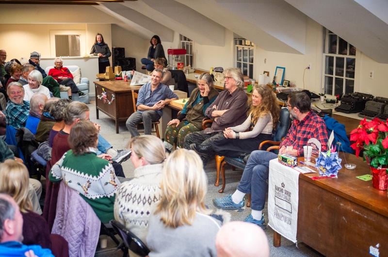 Readers and guests gather to meet the columnists.