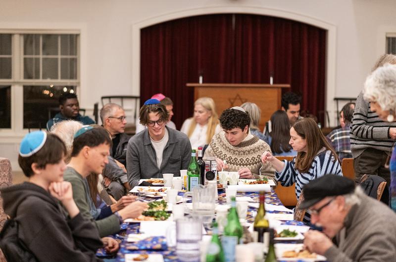 Breaking bread together.